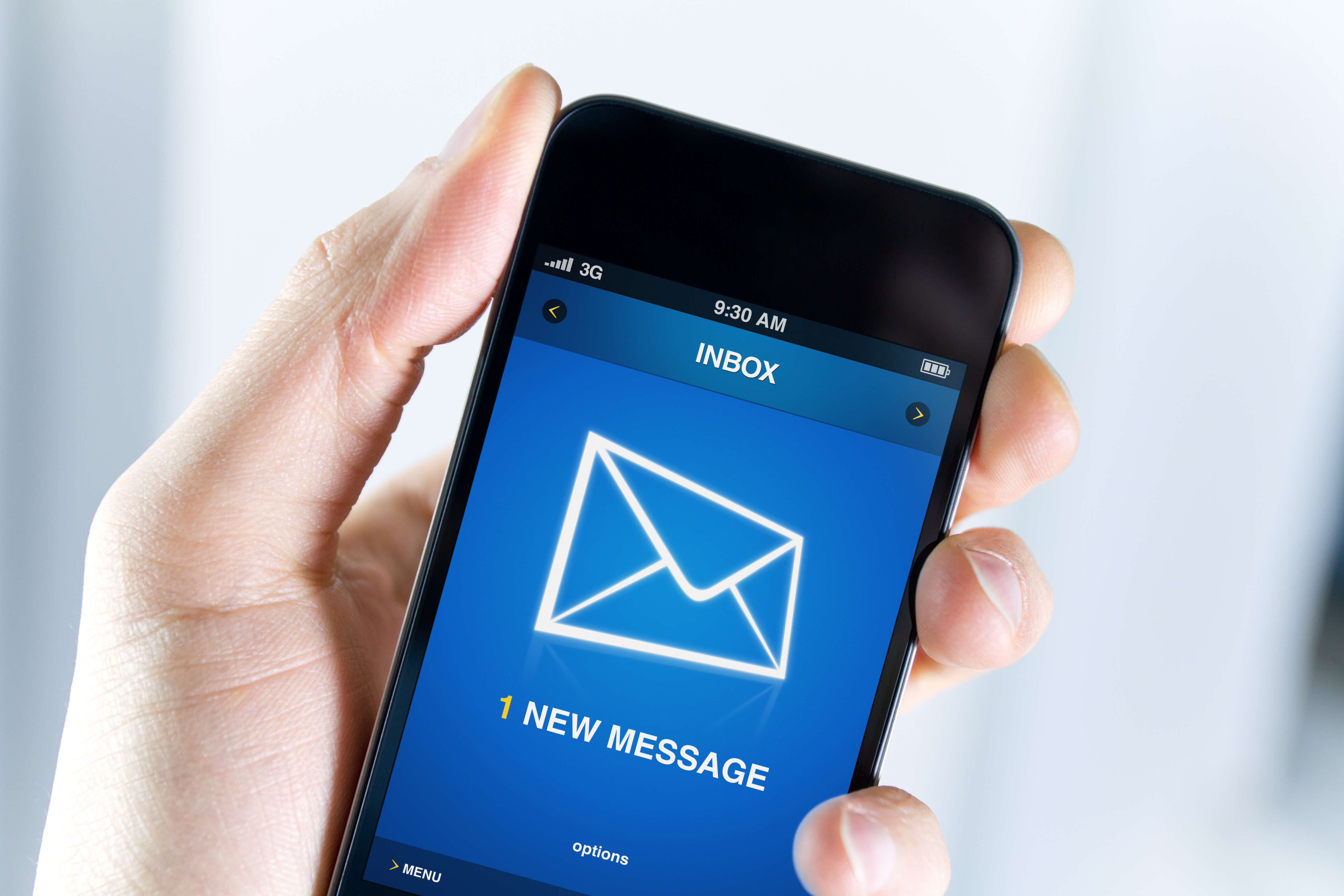 Phone displaying new message notification screen.